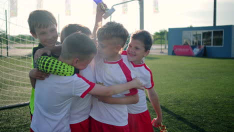 young soccer champions celebrating victory