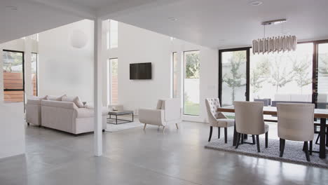 dining area and lounge in stylish and contemporary empty home