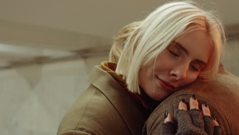 romantic woman embracing boyfriend in underpass