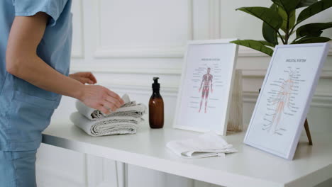 physiotherapist preparing the massage room