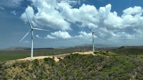 Modern-wind-turbine-windmill-in-Dominican-Republic-and-cloudy-sky