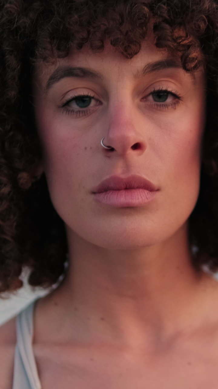 Confident Woman on Bridge in Sports Vest