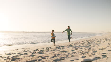 Beach,-happy-and-children-running-for-a-race