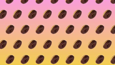 animación abstractamente colorida - vistas laterales de rosquillas con chocolate se mueven hacia arriba en círculo diagonalmente en un fondo de gradiente rosa-amarillo - bucle sin costuras.