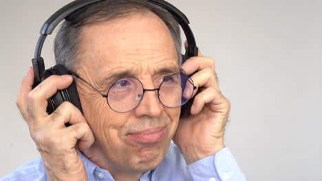 happy older man listening to music