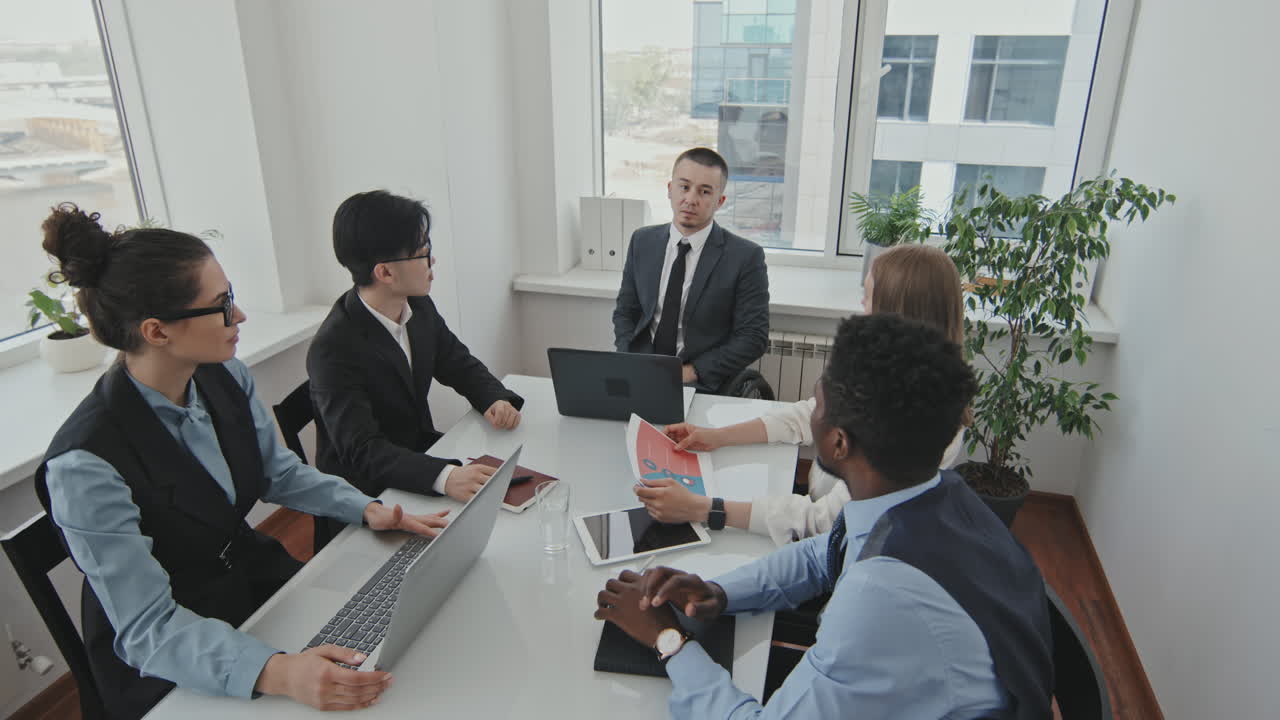 CEO Having Meeting with Colleagues