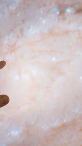 space galaxies on touch screen computer