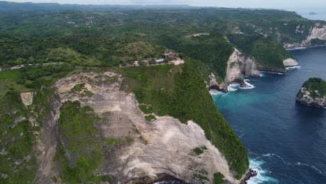 white smooth sea cliffs of paluang and hidden sea cave coves, aerial panoramic overview