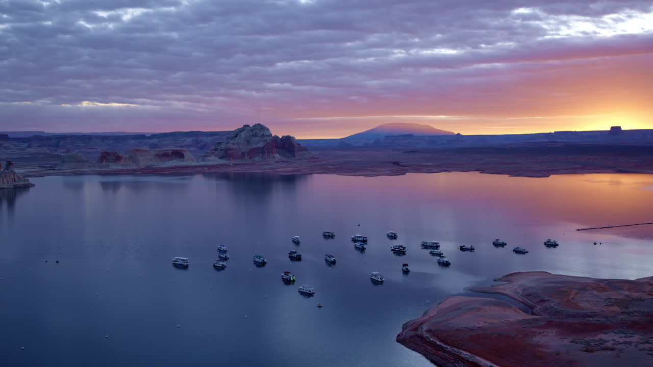 The drone smoothly flies around the dramatic landscapes of Glen Canyon, showcasing its timeless geological beauty.