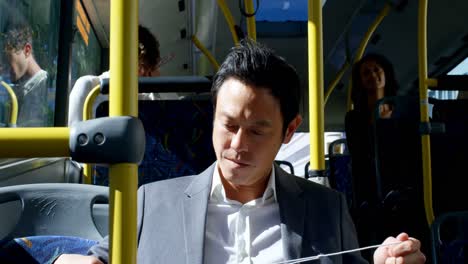 Male-commuter-travelling-in-bus-4k