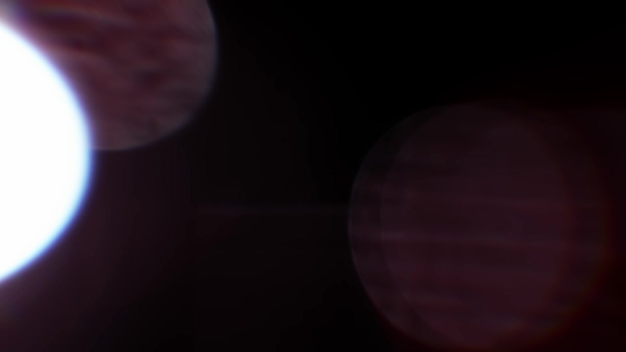 Colorful Optical Lens Flares and Bokeh on Dark Background