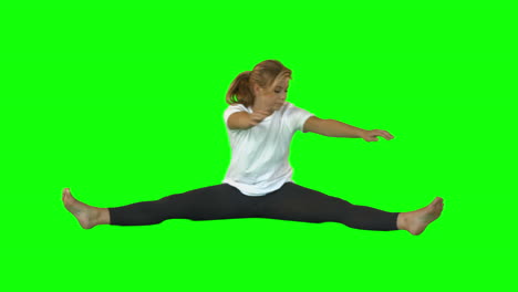 sporty woman stretching hands to legs