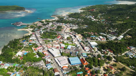 aerial view of town on ko pha ngan island on a sunny day in thailand