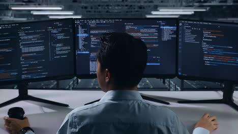 programmer working late at night in a server room