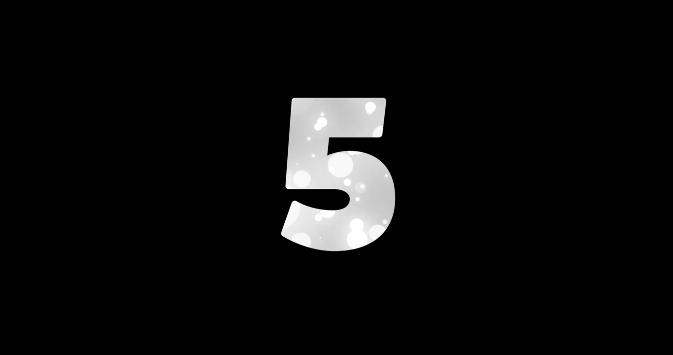 Animation of countdown to midnight and spots of light on black background