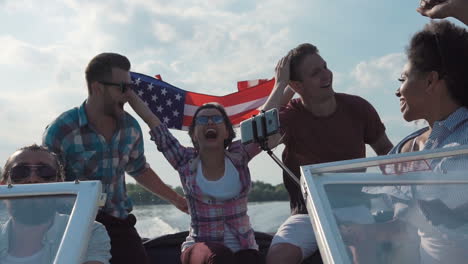 friends celebrating on a boat