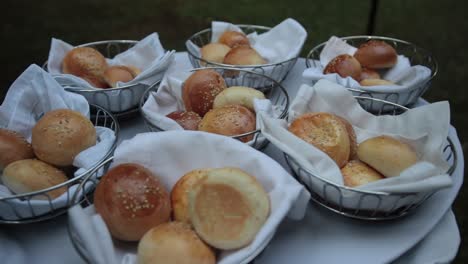 Close-up-shot-of-freshly-baked-buns-on-display-in-a-self-service-catering-buffet-at-the-restaurant-in-hotel