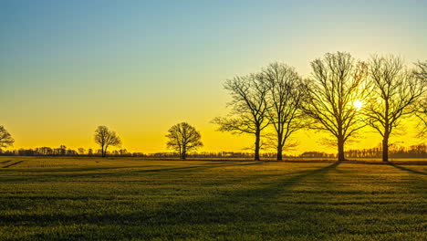 Latvia-beautiful-sunrise,-timelapse-of-daylight-over-park-scenery