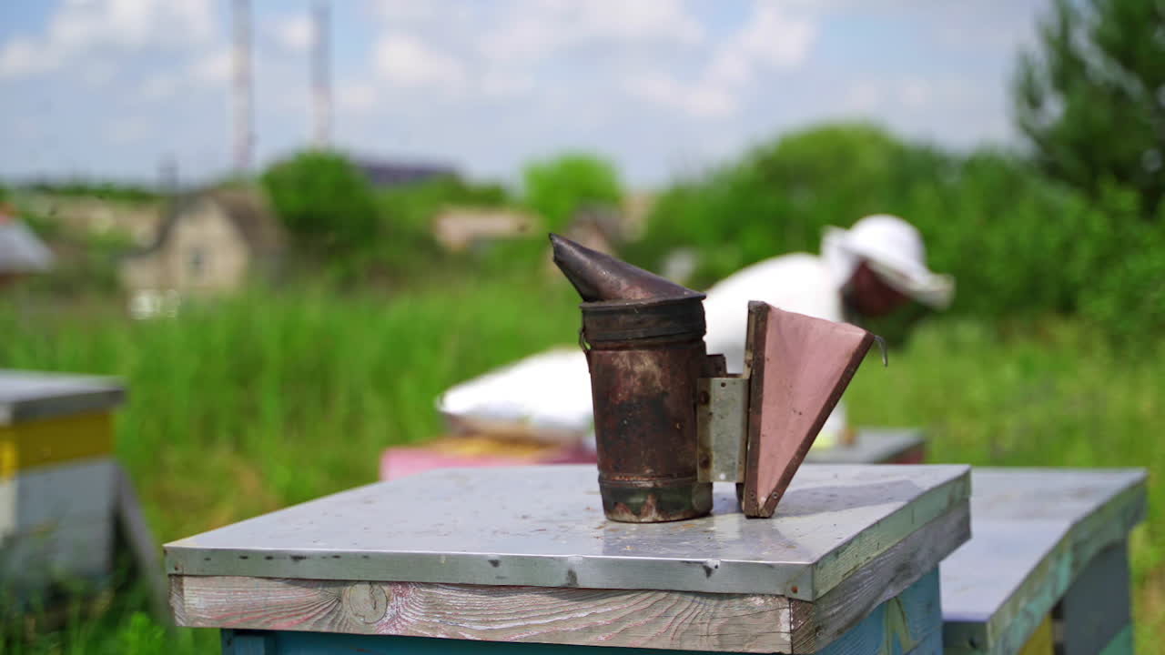 Hives of bees in apiary. Close up of chimney for flashing bees