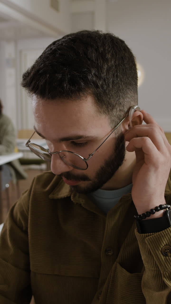 A man with a hearing aid