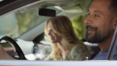 video of couple going on a road trip by car