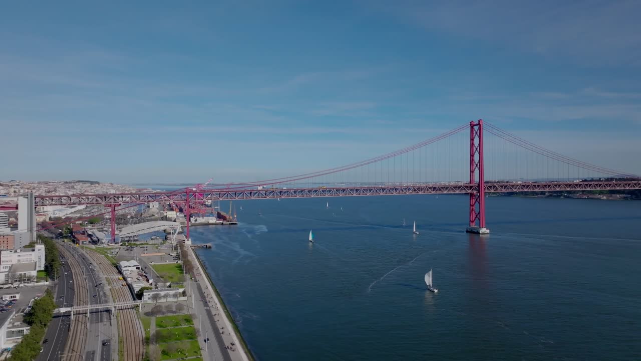 Drone shot of the big bridge in Lisbon.