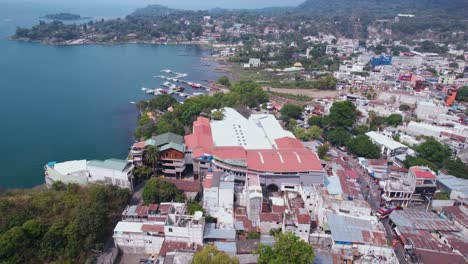 drone shot of santiago atitlan, guatemala. biggest town and port on lake atitlan