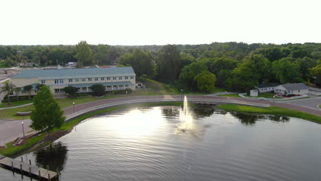 Drone-Pull-Away-Shot-from-Fountain-Over-Lake-in-Central-Florida