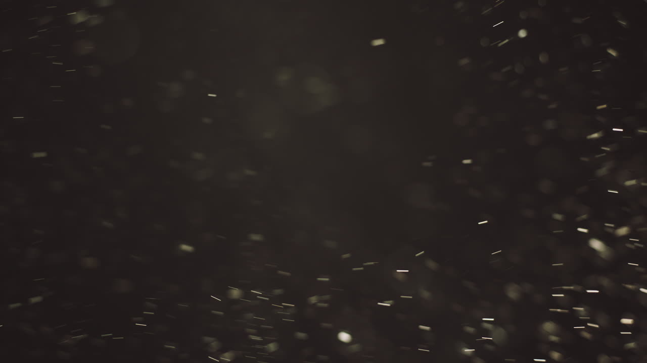 partículas de polvo en fondo oscuro