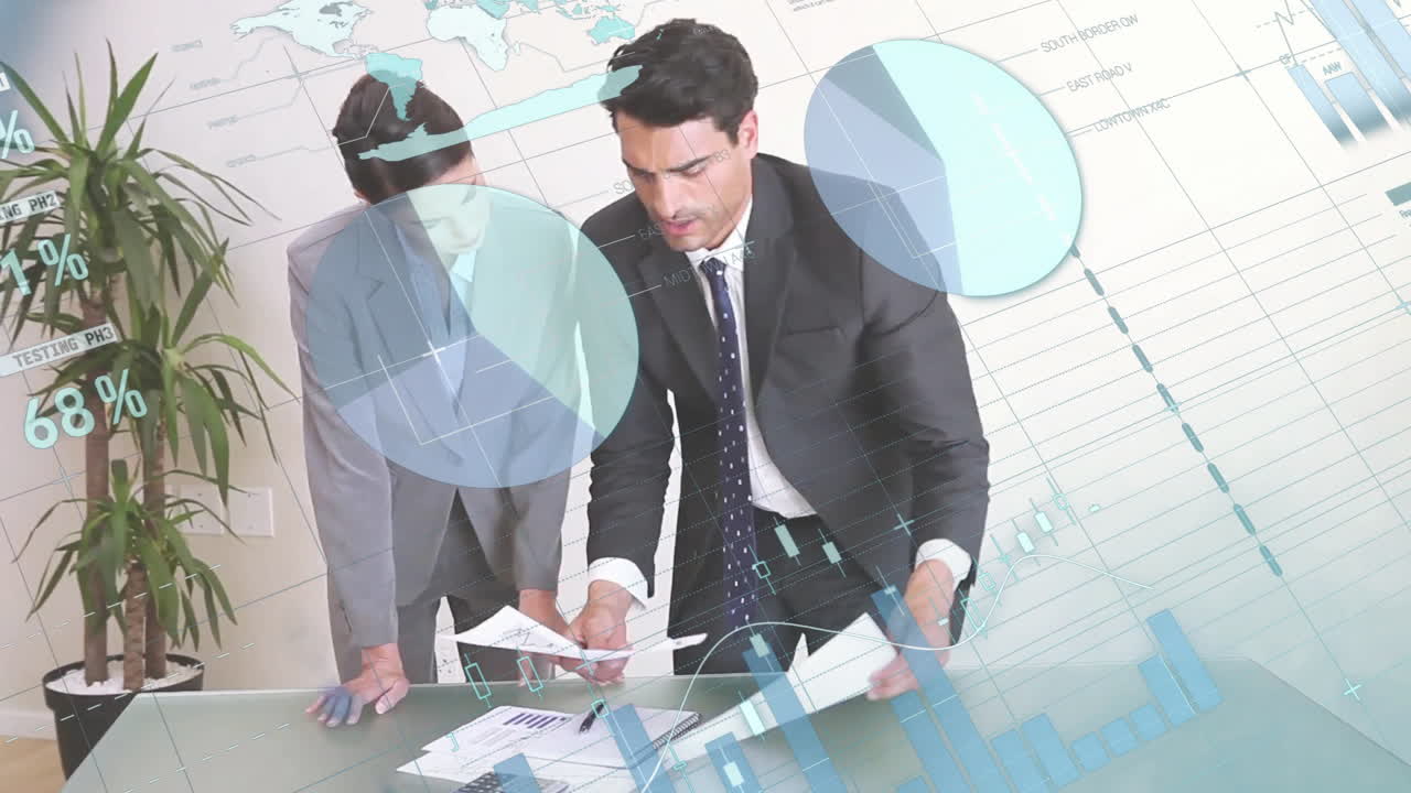 Analyzing documents, business professionals in office with financial data animation overlay
