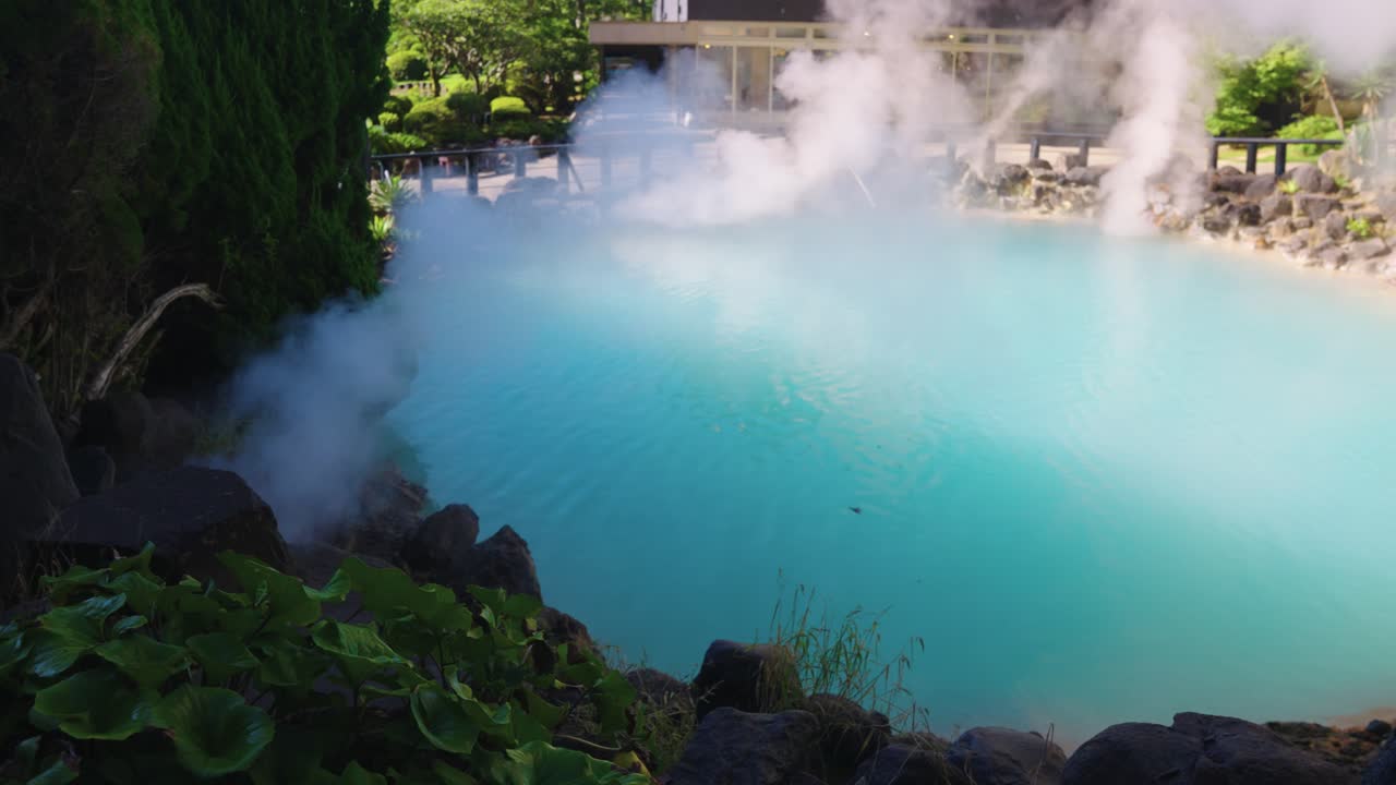 Bright Blue Pool of Boiling Geothermal Water, Beppu Hot Springs in Beppu Japan