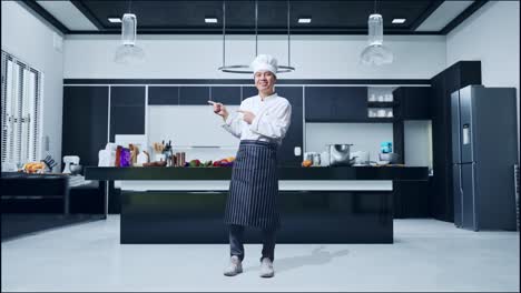 full body of asian man chef smiling and pointing to side while standing in home kitchen