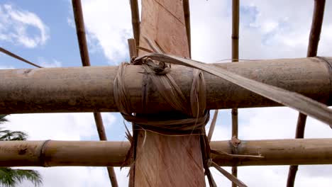 traditional durable timber and bamboo building construction technique with wood, bamboo and flax in southeast asia