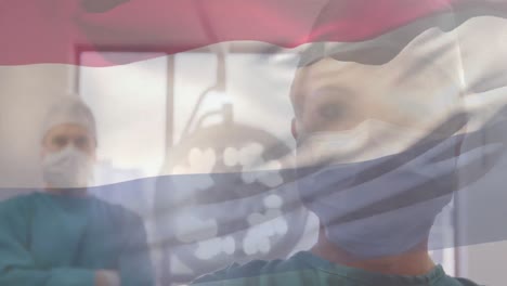 수술실에서 외과 의사 들 위 에 흔들리는 네덜란드 의  ⁇ 발 의 애니메이션