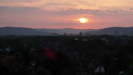 aerial view of binghamton, new york at sunrise. shot during the summer in 4k.