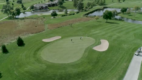 orbit of group on golf couse hole aerial