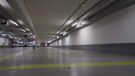 smart parking zone with green blinking lights indicating free available parking space for vehicles