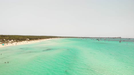 Spain,-Mallorca-Platja-des-Trenc-beach-a-beautiful-fly-by-over-the-beach-at-4k-24-fps-with-ND-filters-on-a-very-bright-day-with-a-DJI-Mavic-Air-drone