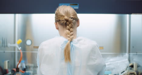 scientist working on virus cure at laboratory 9