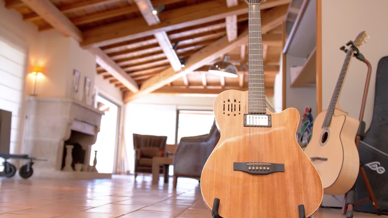 Guitar on stand cozy furnished apartment loft