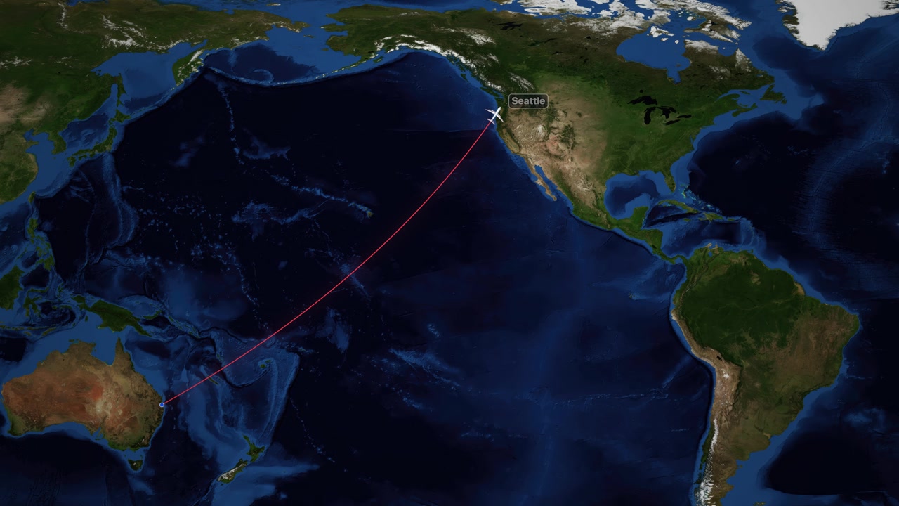 Satellite world map animation follows an airplane flying from Brisbane to Seattle across the Pacific