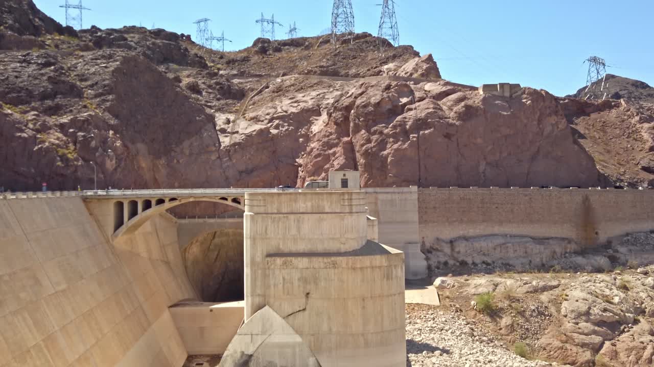 Driving cars on Hoover Dam from Nevada