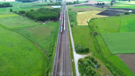 cargo and passenger train, aeral view 4k