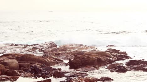waves crashing on rocks