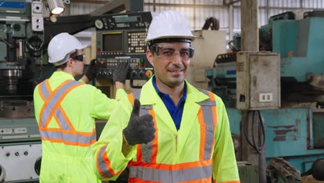 young factory worker or engineer close up portrait in factory