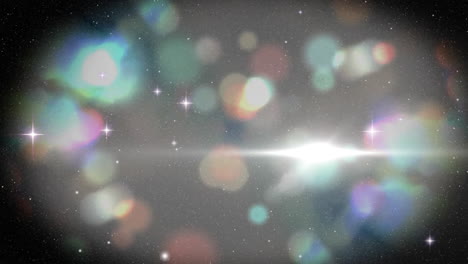 estrellas brillantes y manchas brillantes de luz contra el negro bakgroundblak