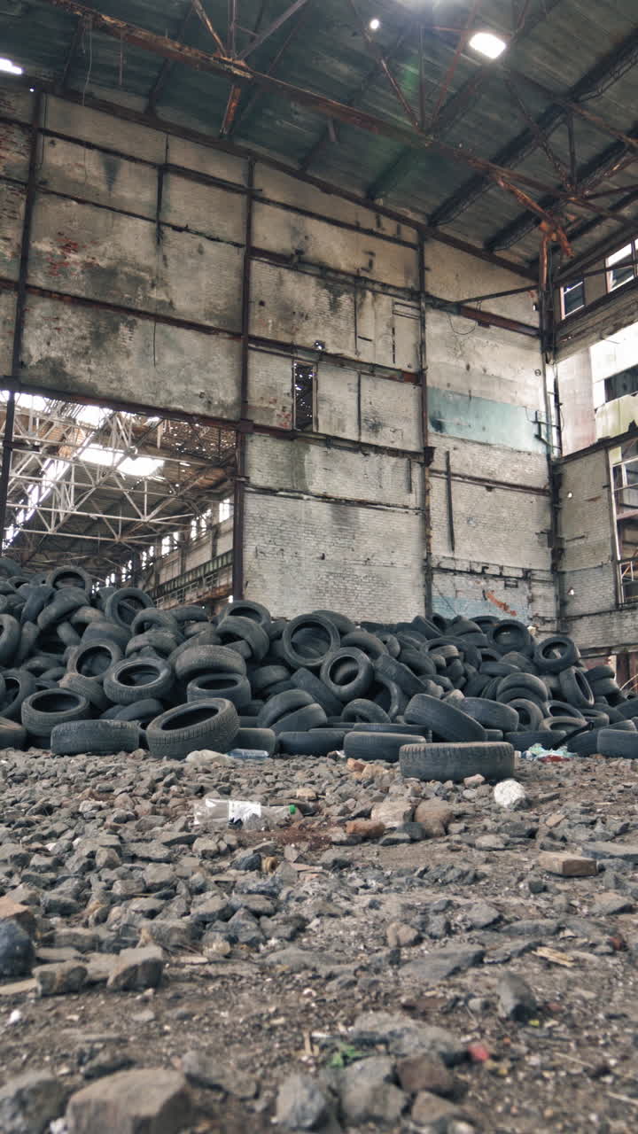 Empty Storehouse Interior For Background. Industrial abandoned building interior in dark colors Vertical video