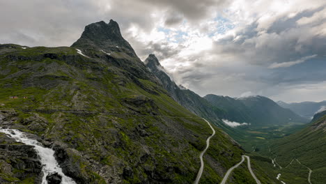 vehicles driving at trollstigen serpentine mountain road in norway