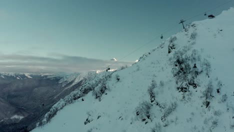 Ski-Chairlift-Ascending-to-Mountaintop---Beautiful-Winter-Background