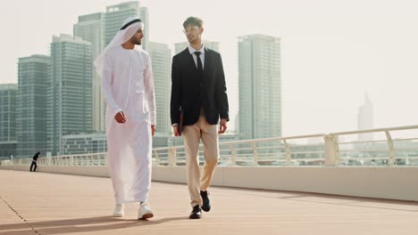 businessmen walking in dubai city